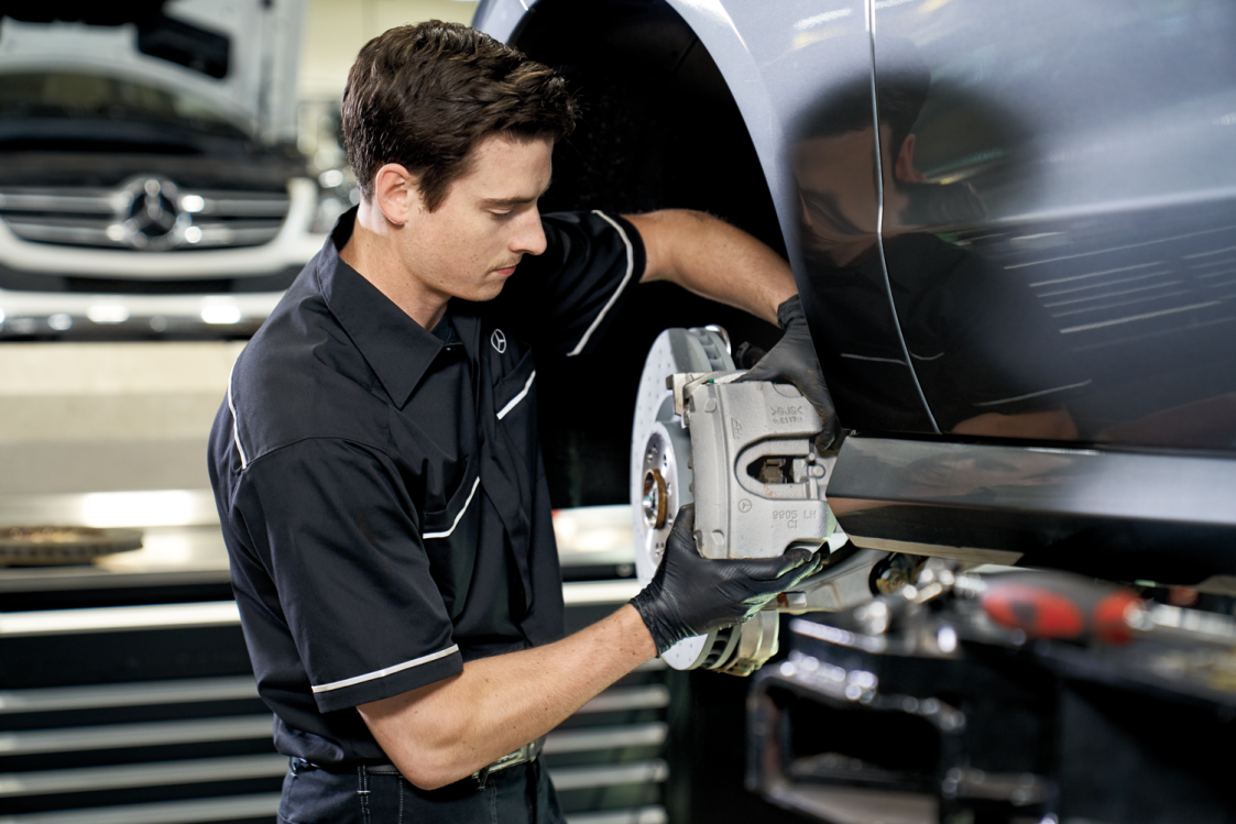 Mercedes-Benz technician performing brake service