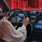 Woman driving a 2024 Mercedes-Benz C-Class sedan